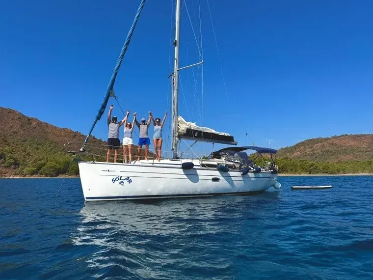 Guests greeting from the deck of the Bavaria 38